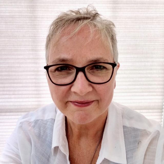 A picture of Joanna smiling.